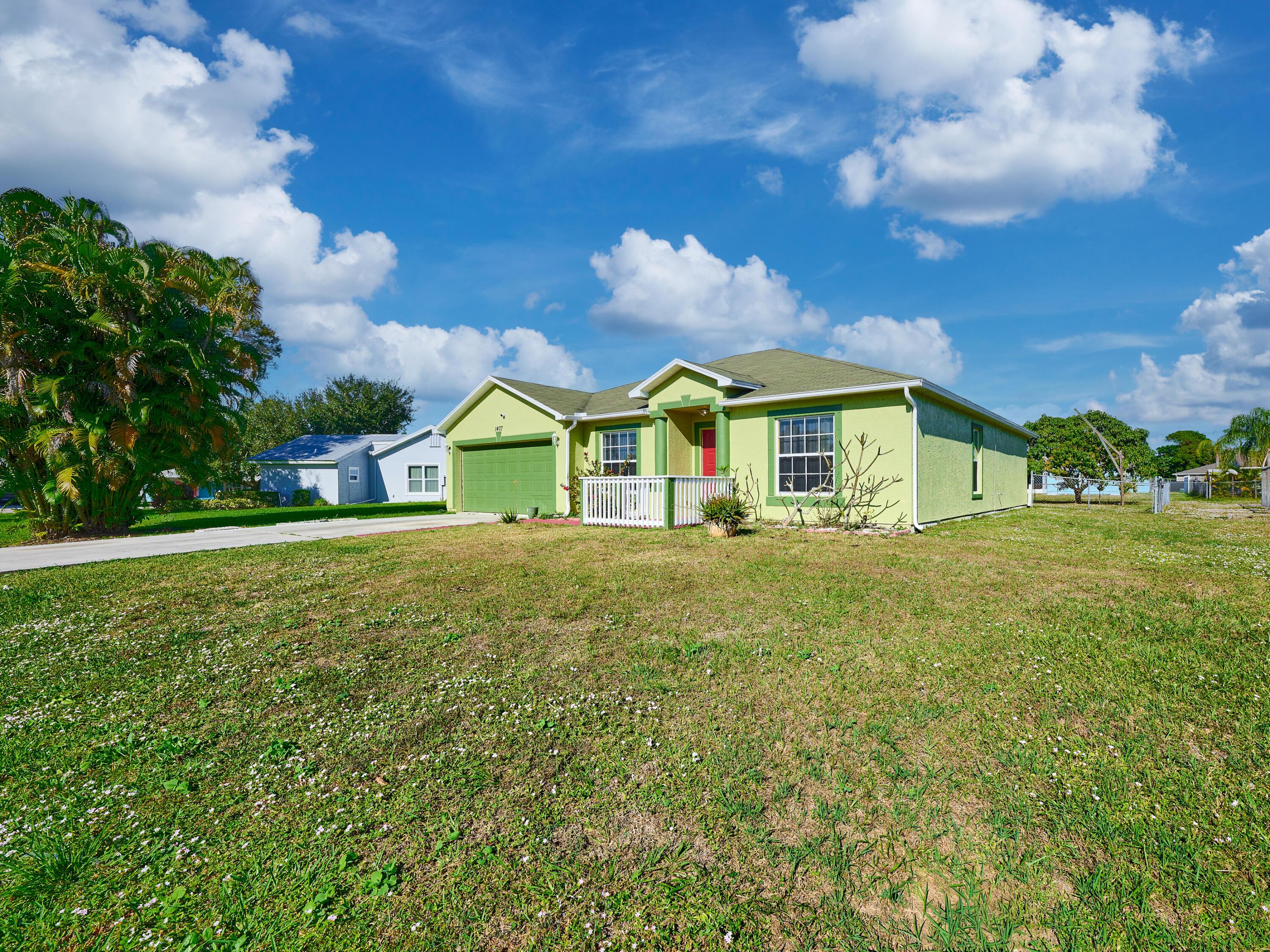 1407 SE Grapeland Avenue, Port St. Lucie, FL 34952, Port St. Lucie - Photo 2