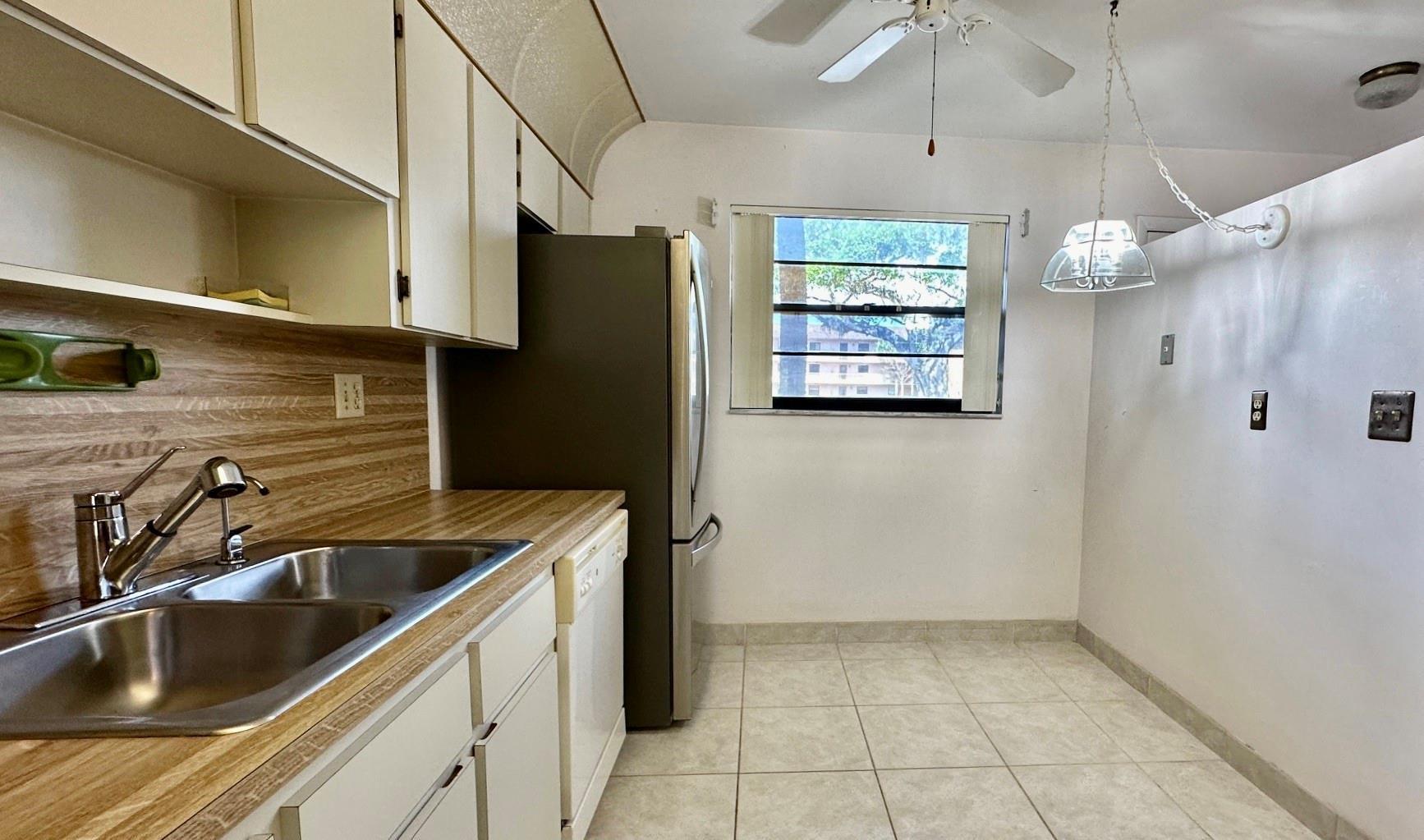 6090 N Sabal Palm Boulevard 108, Tamarac, FL 33319, Tamarac - Photo 5