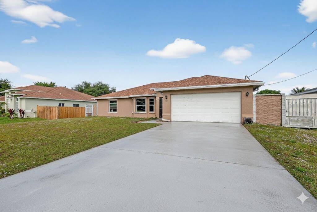 557 SW Halkell Avenue, Port St. Lucie, FL 34953, Port St. Lucie - Photo 2