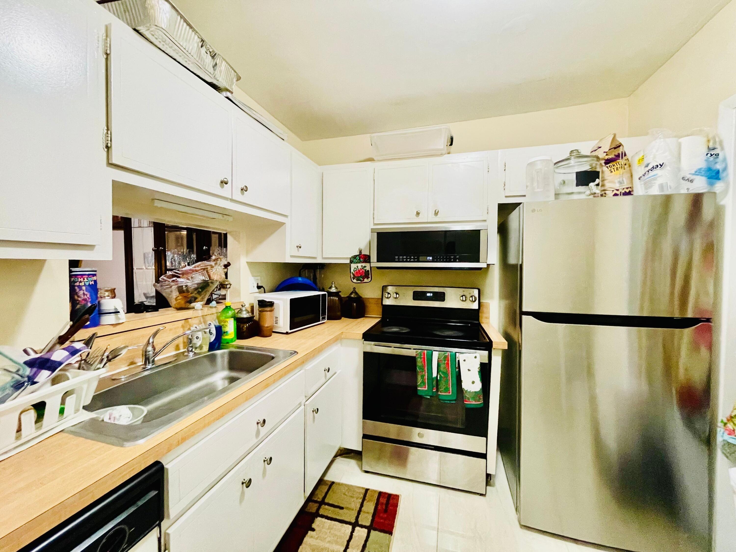 5051 W Oakland Park Boulevard W Unit E212, Lauderdale Lakes, FL 33313, Lauderdale Lakes - Photo 3