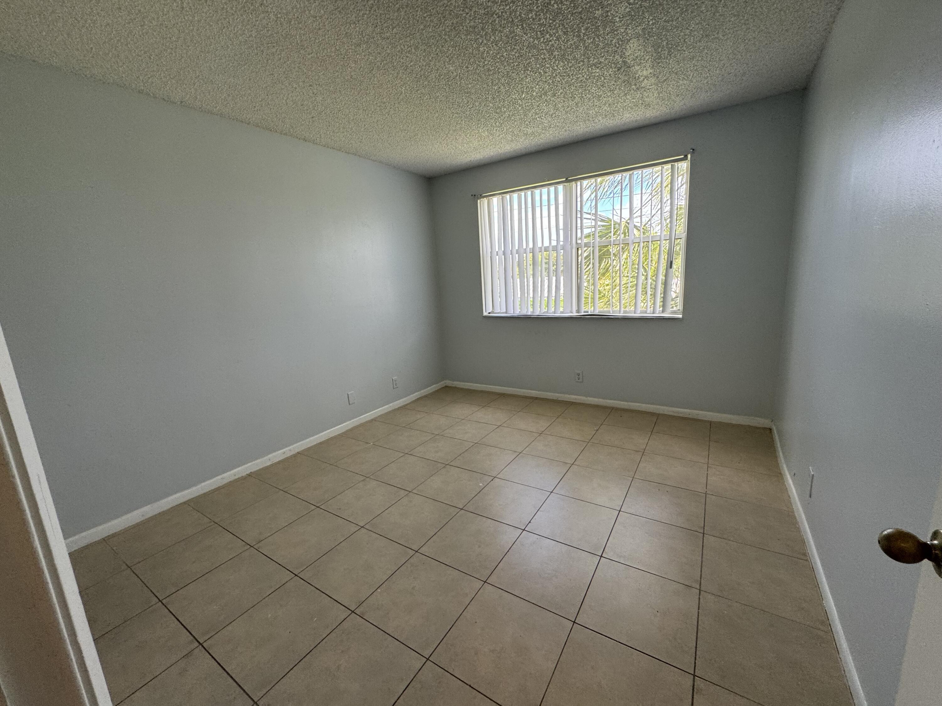 8891 Wiles Road 303, Coral Springs, FL 33067, Coral Springs - Photo 5