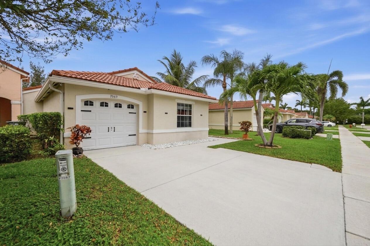 7069 Burgess Drive, Lake Worth, FL 33467, Lake Worth - Photo 2