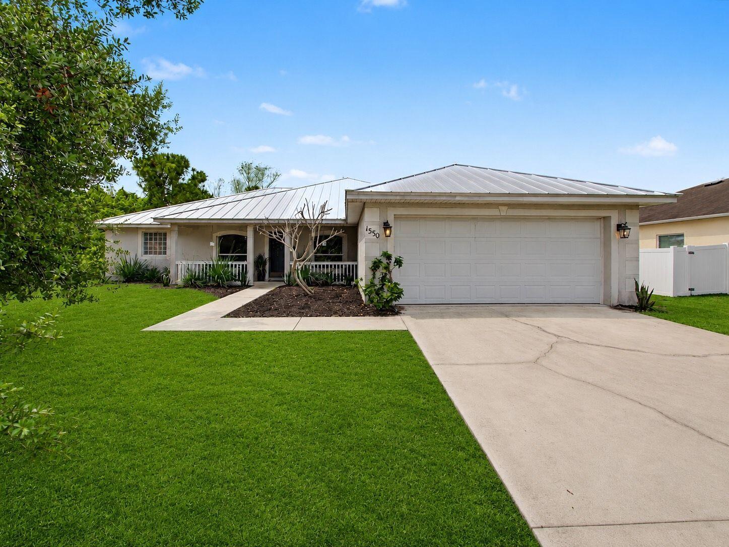 1550 SW Kosnar Avenue, Port St. Lucie, FL 34953, Port St. Lucie
