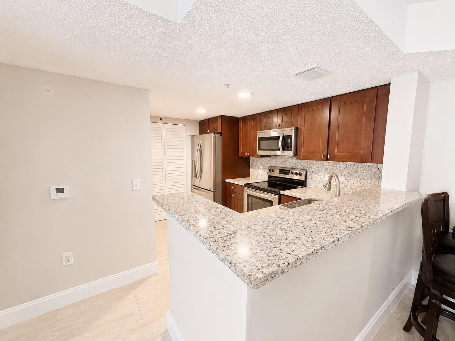 5045 Wiles Road 105, Coconut Creek, FL 33073, Coconut Creek - Photo 4