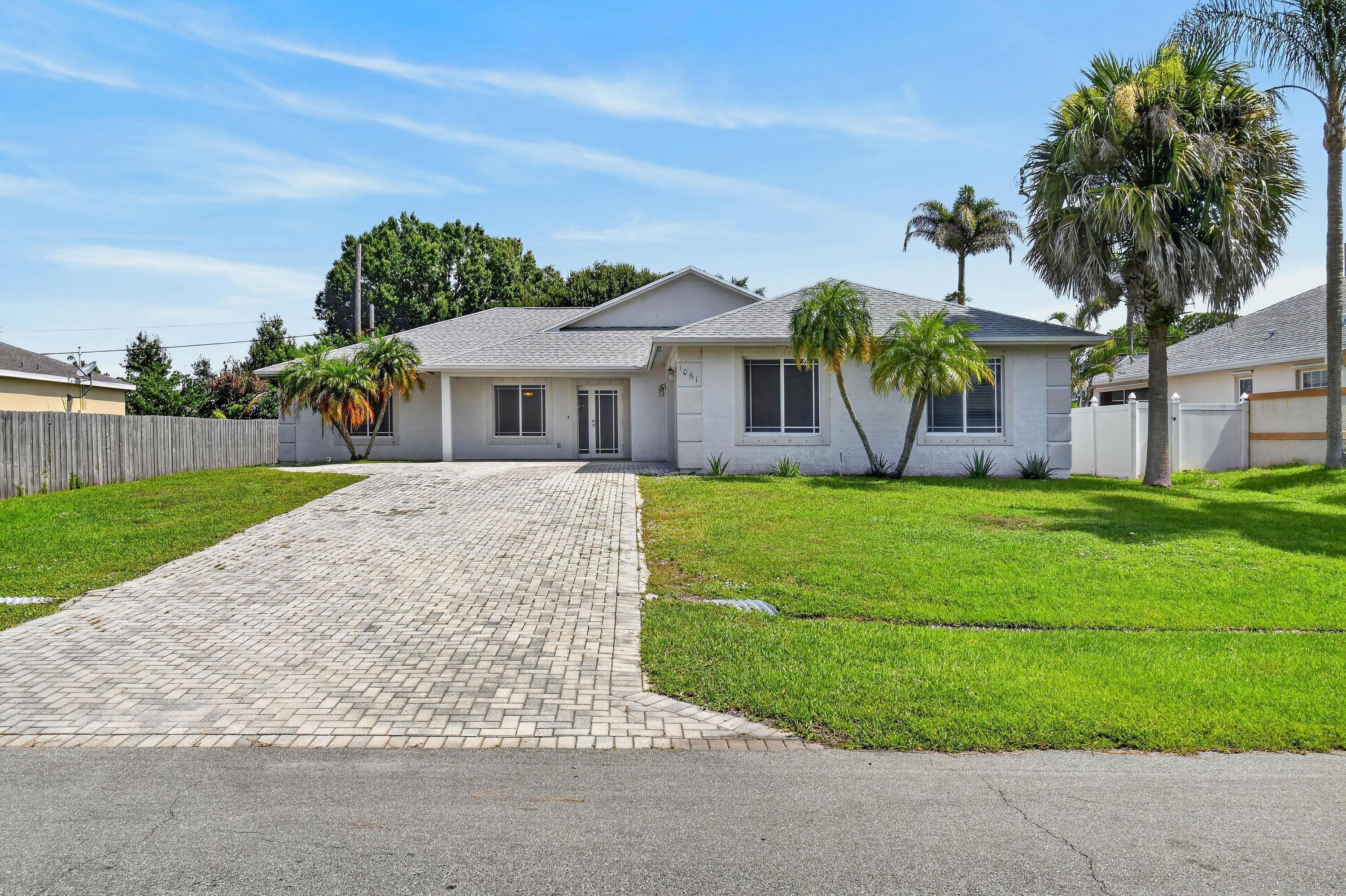 1061 SW BENSCHOP Avenue, Port St. Lucie, FL 34953, Port St. Lucie