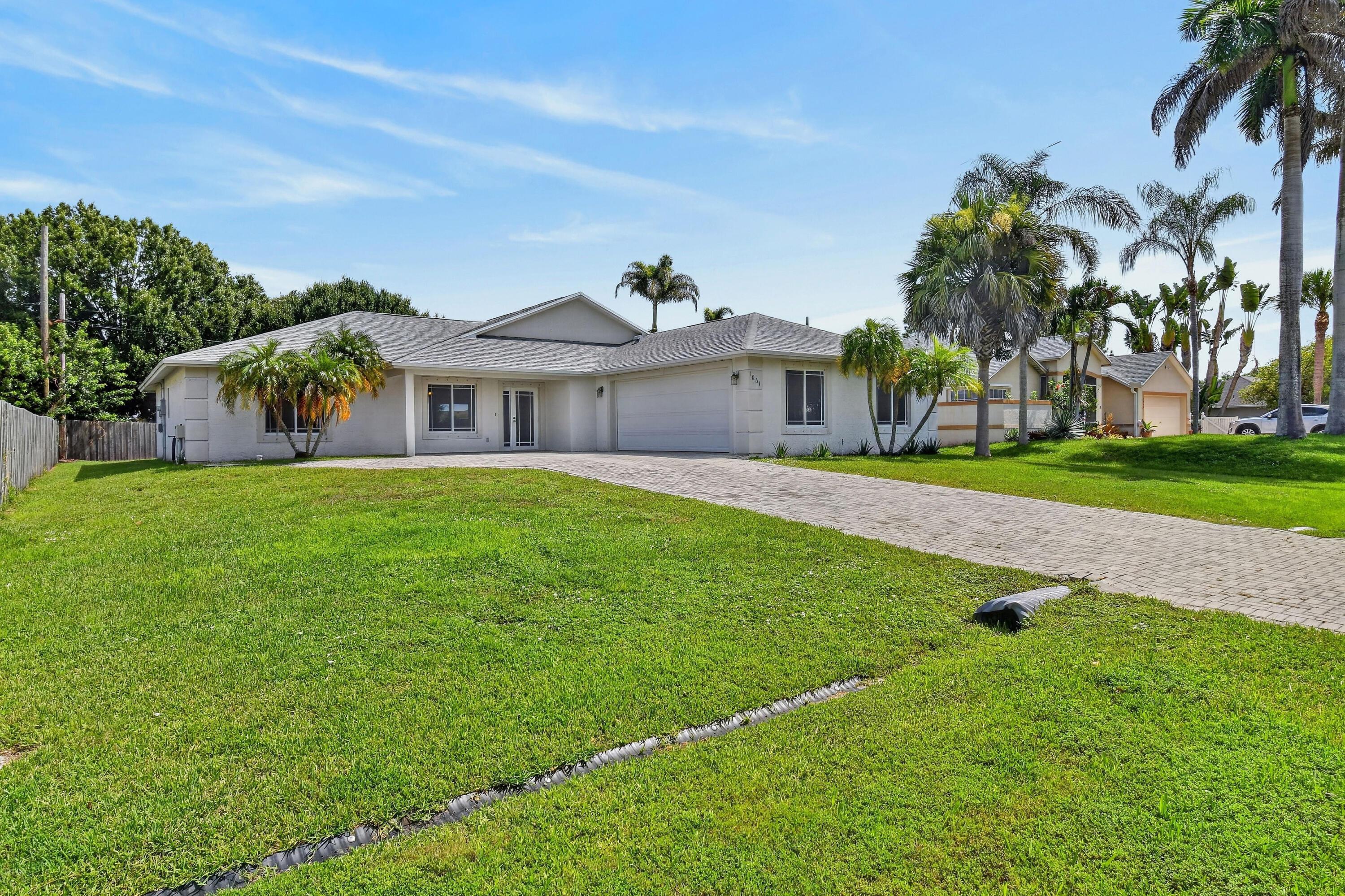 1061 SW BENSCHOP Avenue, Port St. Lucie, FL 34953, Port St. Lucie - Photo 2