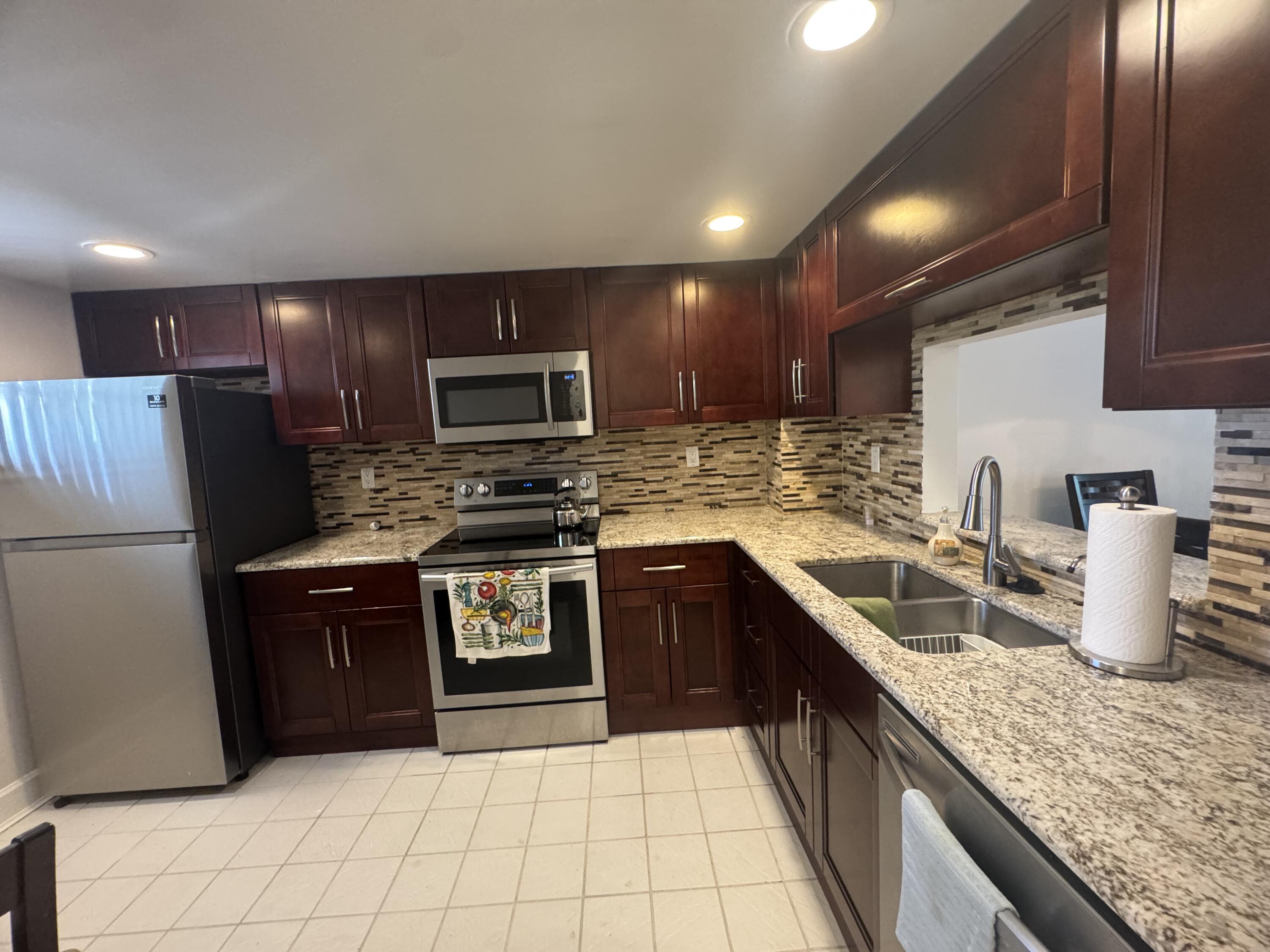 1075 Riverside Drive 303, Coral Springs, FL 33071, Coral Springs - Photo 2