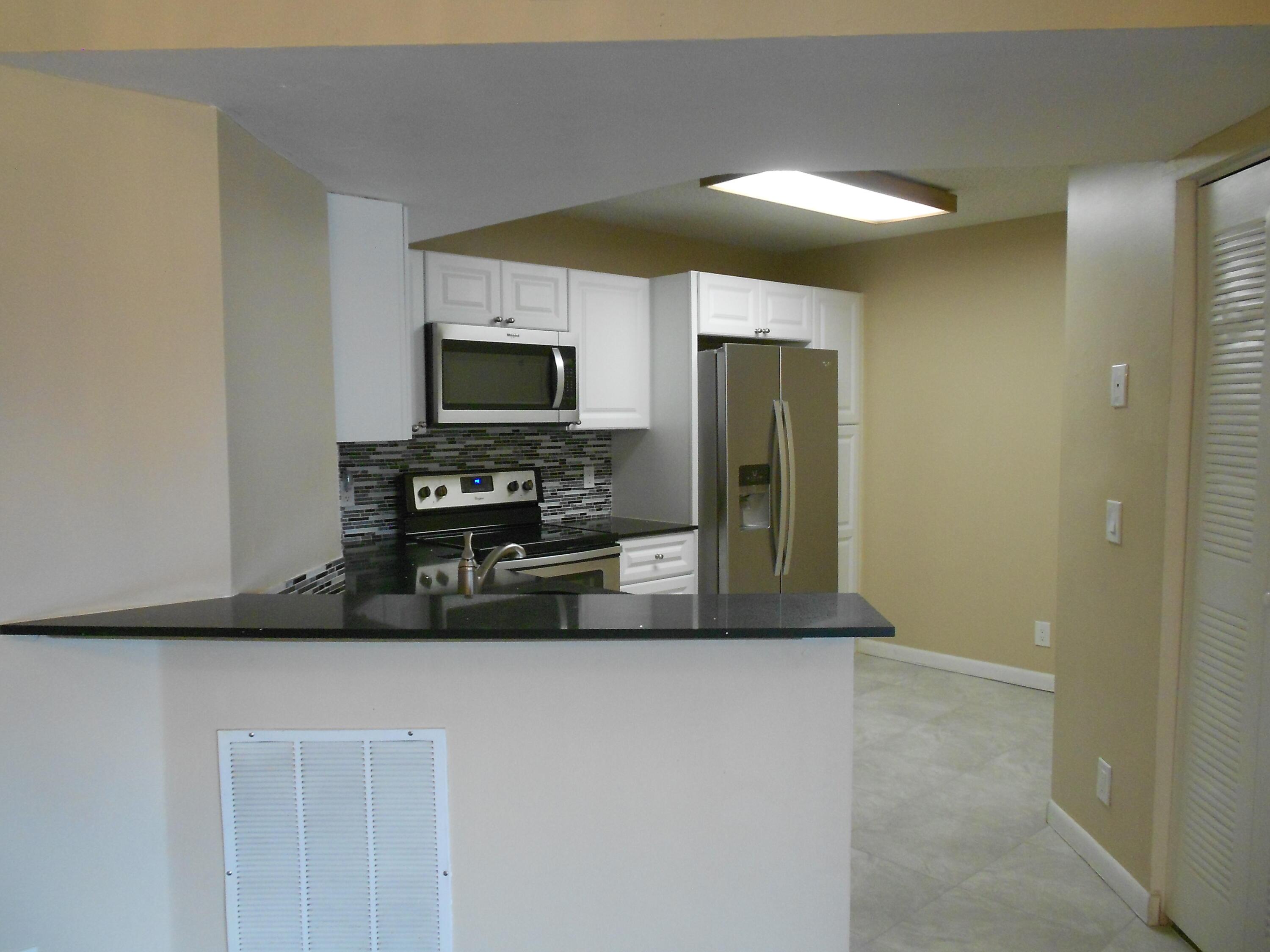 8977 Wiles Road 203, Coral Springs, FL 33067, Coral Springs - Photo 4
