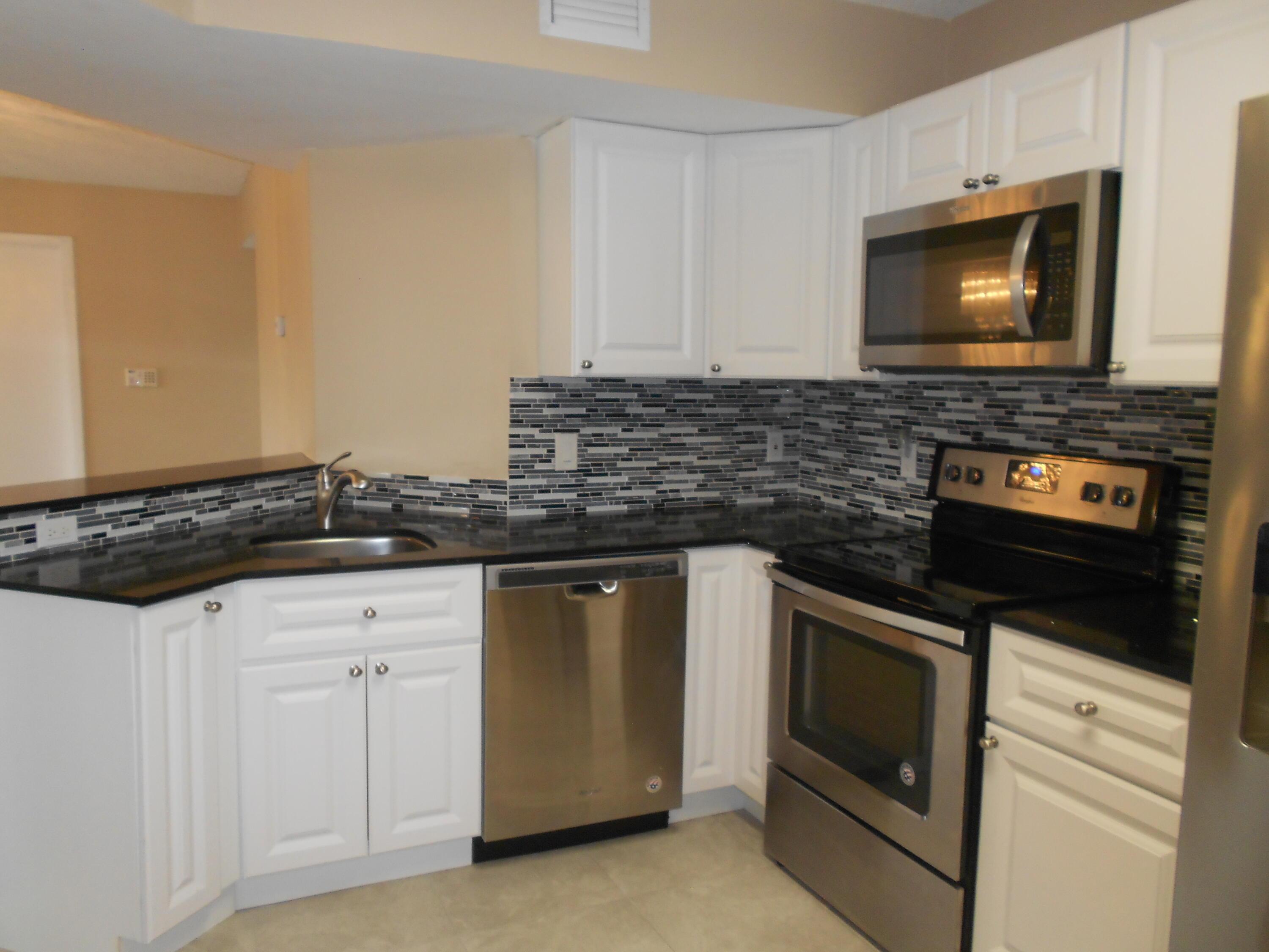 8977 Wiles Road 203, Coral Springs, FL 33067, Coral Springs - Photo 3