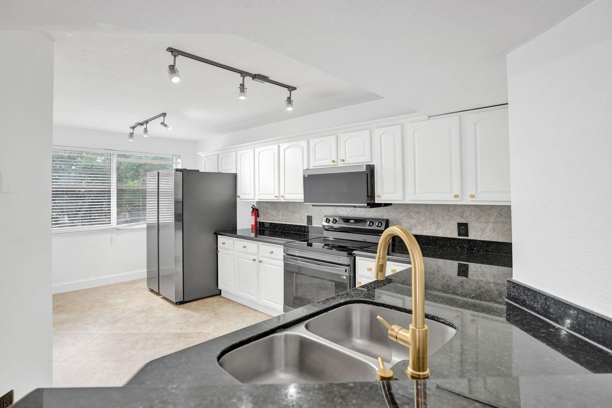 8761 Wiles Road 301, Coral Springs, FL 33067, Coral Springs - Photo 3